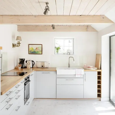 בית נופש Urgemuetliche Reetdachkate Mit Grossem Kamin Und Sauna